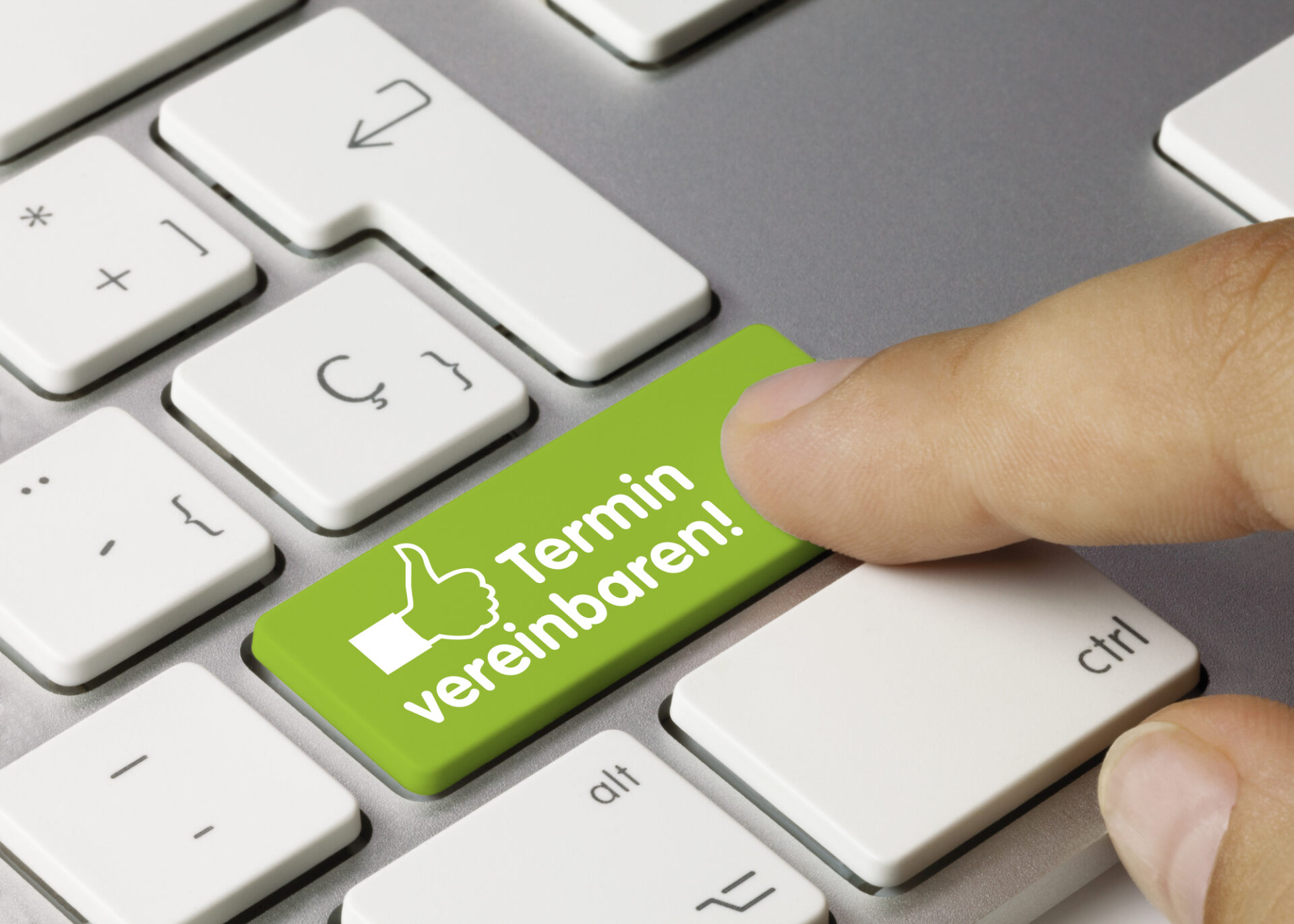 Termin vereinbaren - Wort auf grüner Taste Tastatur mit "Termin vereinbaren!"-Taste